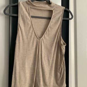Short tan tank top- shows cleavage